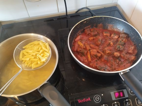 Transfer the pasta with a spider skimmer to the pan.