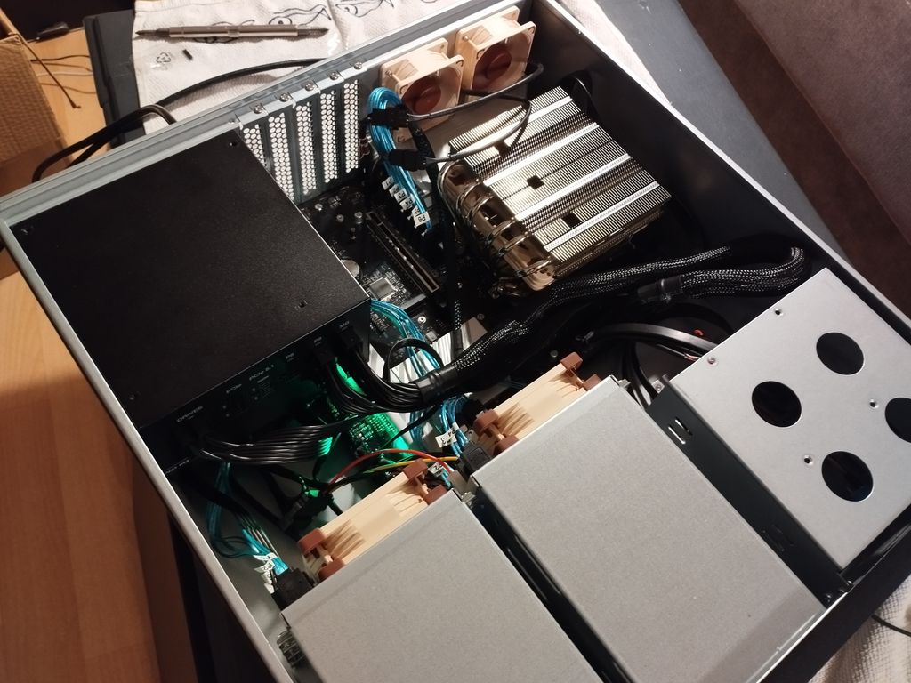 The main server with the top part of the case removed, showing the motherboard and components.